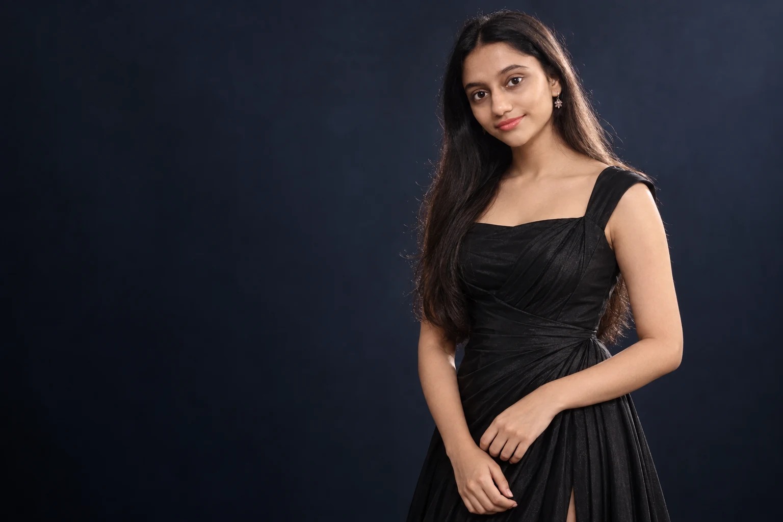 Sreejata in a black evening gown in a cinematic studio editorial concept